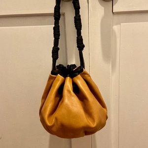 Anthropologie All Dressed up 💯% Leather pouch bag